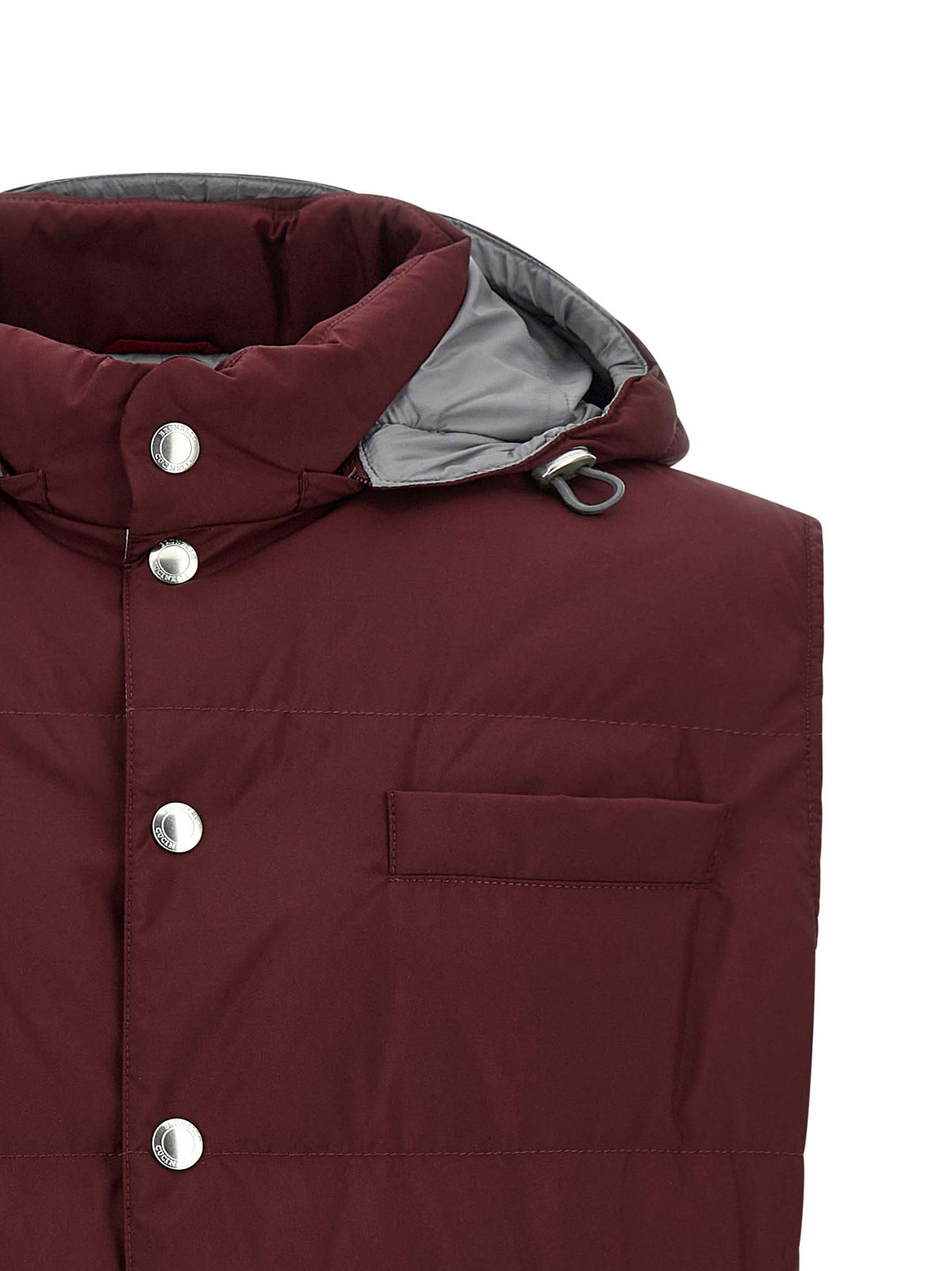 Elevate your wardrobe with the Brunello Cucinelli Bordeaux Polyester Sleeveless Jacket, a masterpiece of exquisite craftsmanship and luxurious style, perfect for any occasion.