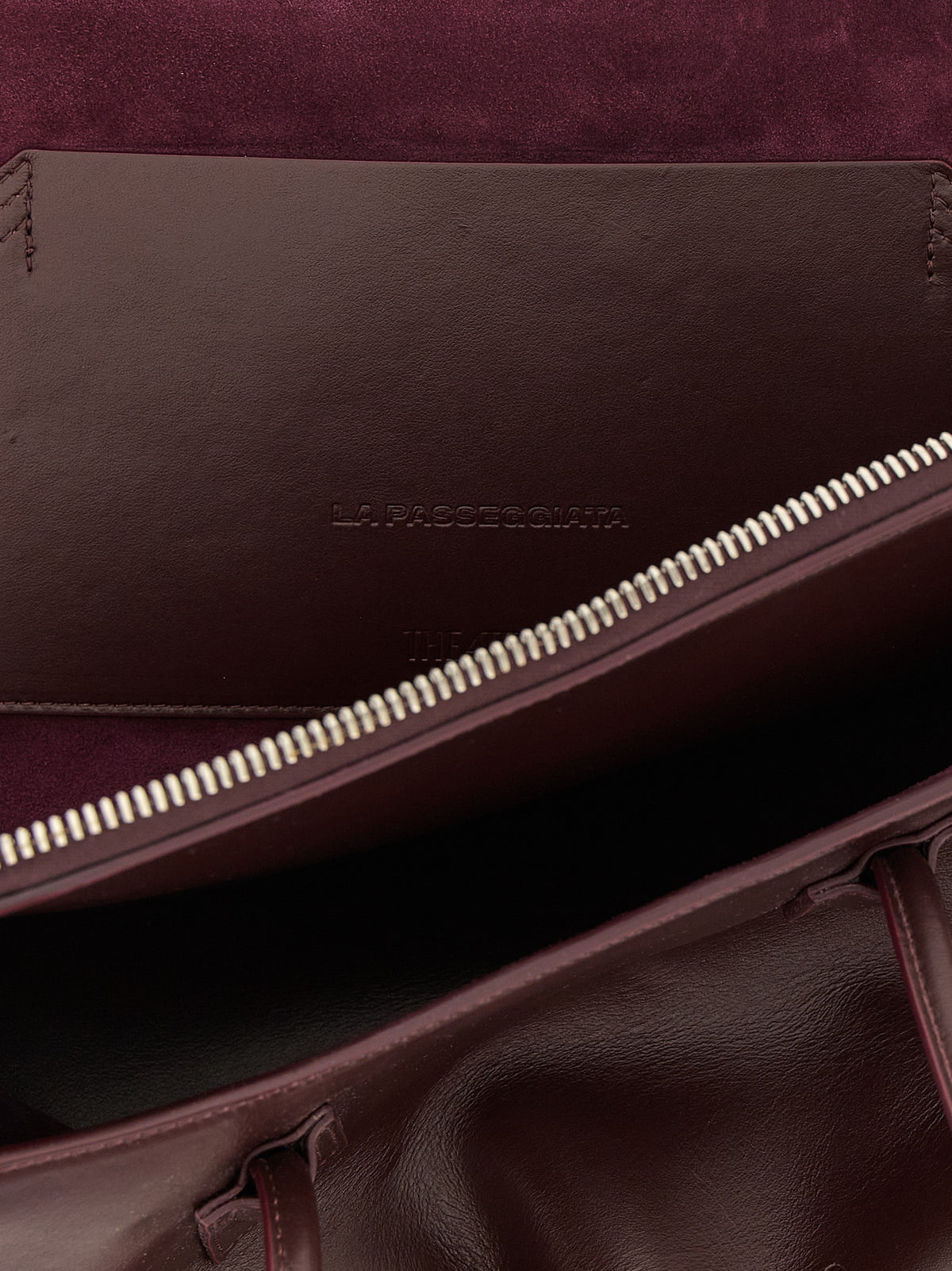 Indulge in the exquisite allure of The Attico Purple Bovine Leather Shoulder Bag from the La Passeggiata collection, crafted from fine calf leather for a statement of luxury and sophistication.