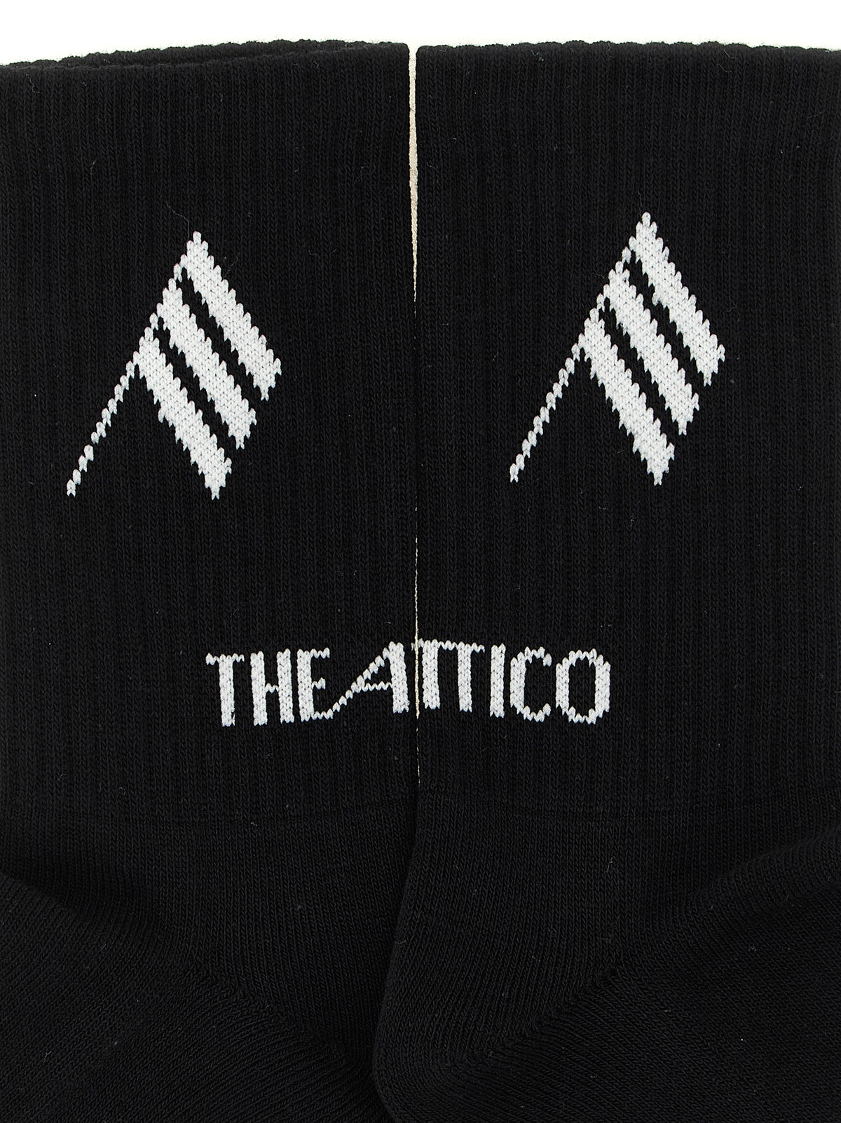 Elevate your style with The Attico Bicolor Cotton Socks, crafted from a luxurious stretch cotton blend, merging comfort and sophistication for the discerning individual.
