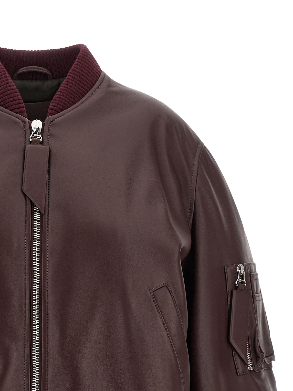 Discover the Attico Bordeaux Lamb Leather Jacket, a masterpiece of pure lambskin that embodies luxurious craftsmanship and an oversized silhouette for timeless elegance.