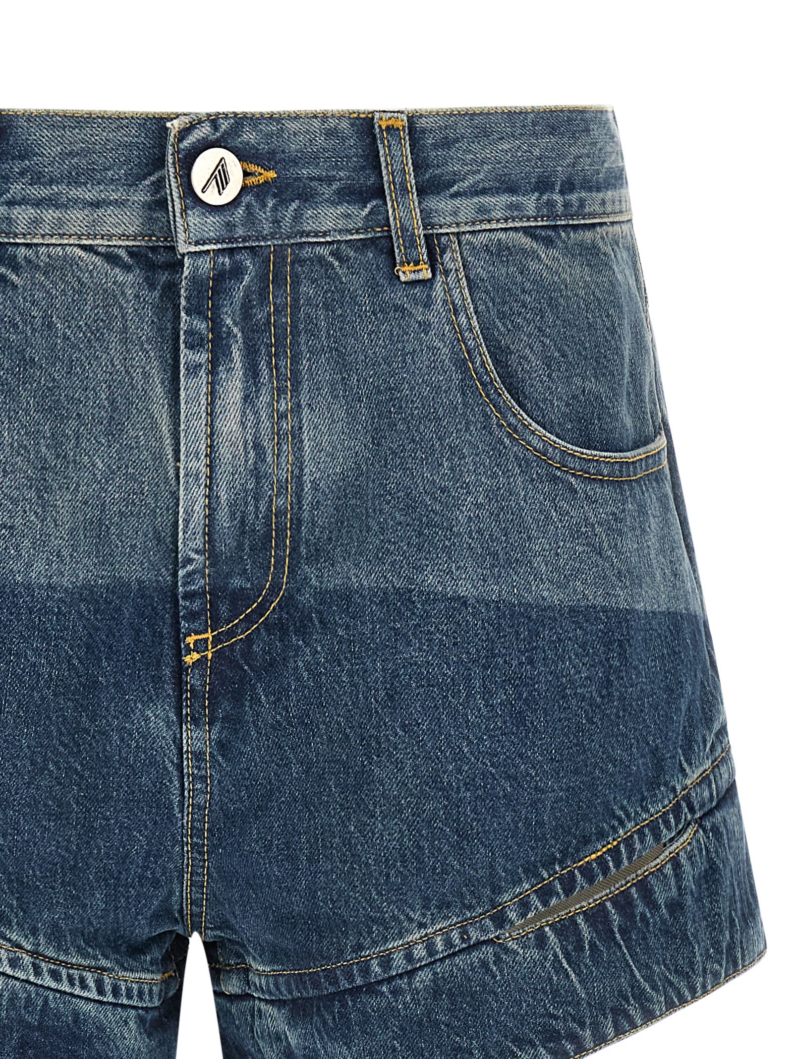Discover The Attico Blue Cotton Bermuda Shorts, a testament to Italian craftsmanship. Elevate your wardrobe with this luxurious piece, blending elegance and modern flair.