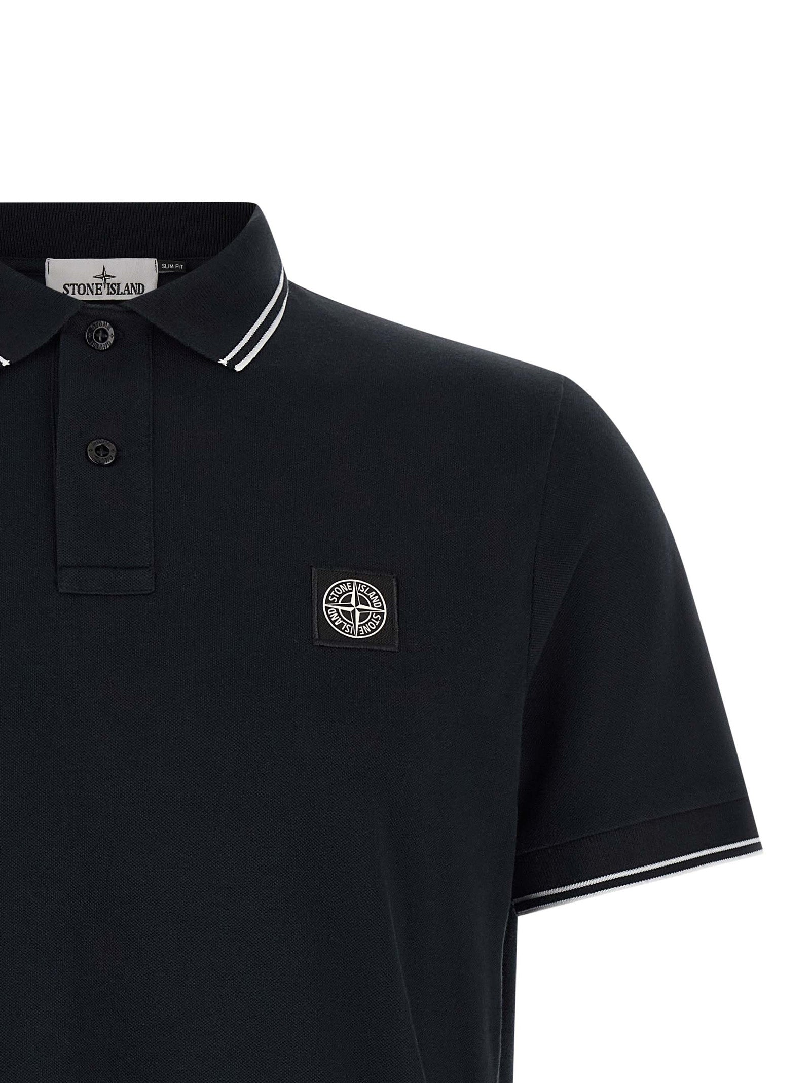 Discover the Stone Island Blue Cotton Polo Shirt, a masterpiece of stretch cotton piqué that embodies sophistication and timeless elegance for the discerning individual.