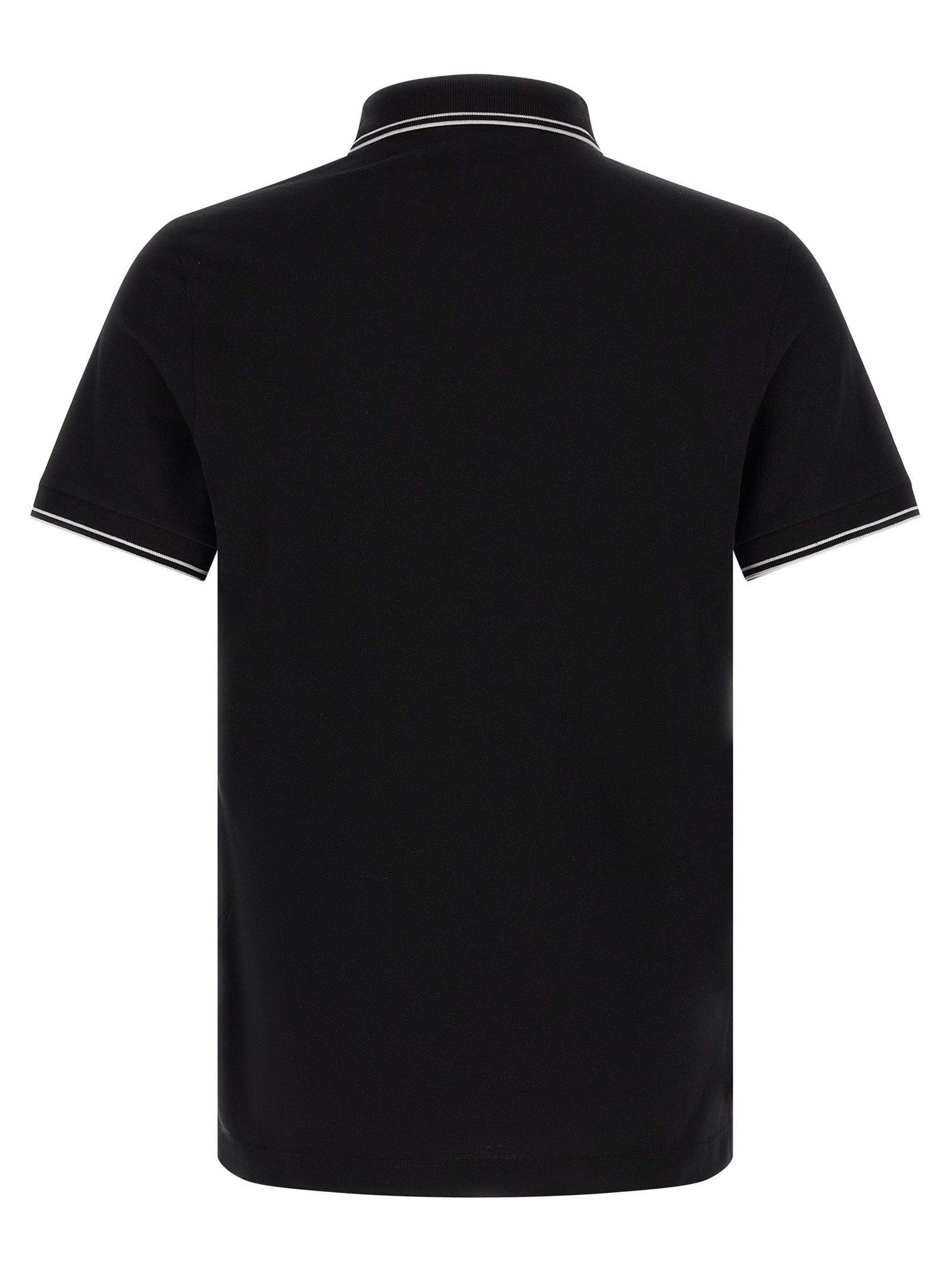 Experience the essence of sophistication with the Stone Island Black Cotton Polo Shirt, crafted from premium stretch cotton for unparalleled comfort and timeless elegance.