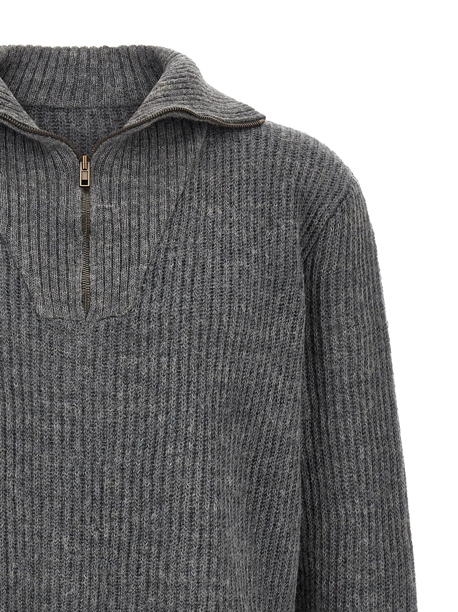 Experience the artisanal elegance of the Maison Margiela Gray Linen Cardigan, crafted from luxurious linen and wool, perfect for elevating your sophisticated wardrobe.