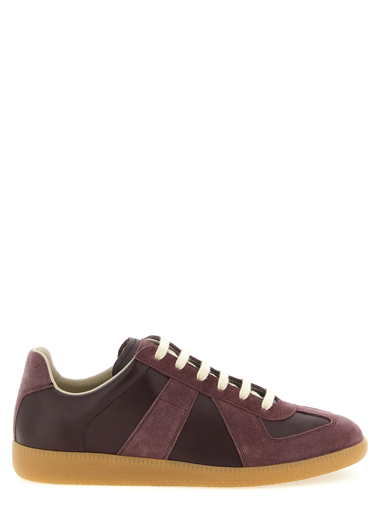 Indulge in the exquisite Maison Margiela Bordeaux Calfskin Low Top Sneakers, where luxurious craftsmanship meets timeless elegance, elevating your style effortlessly.