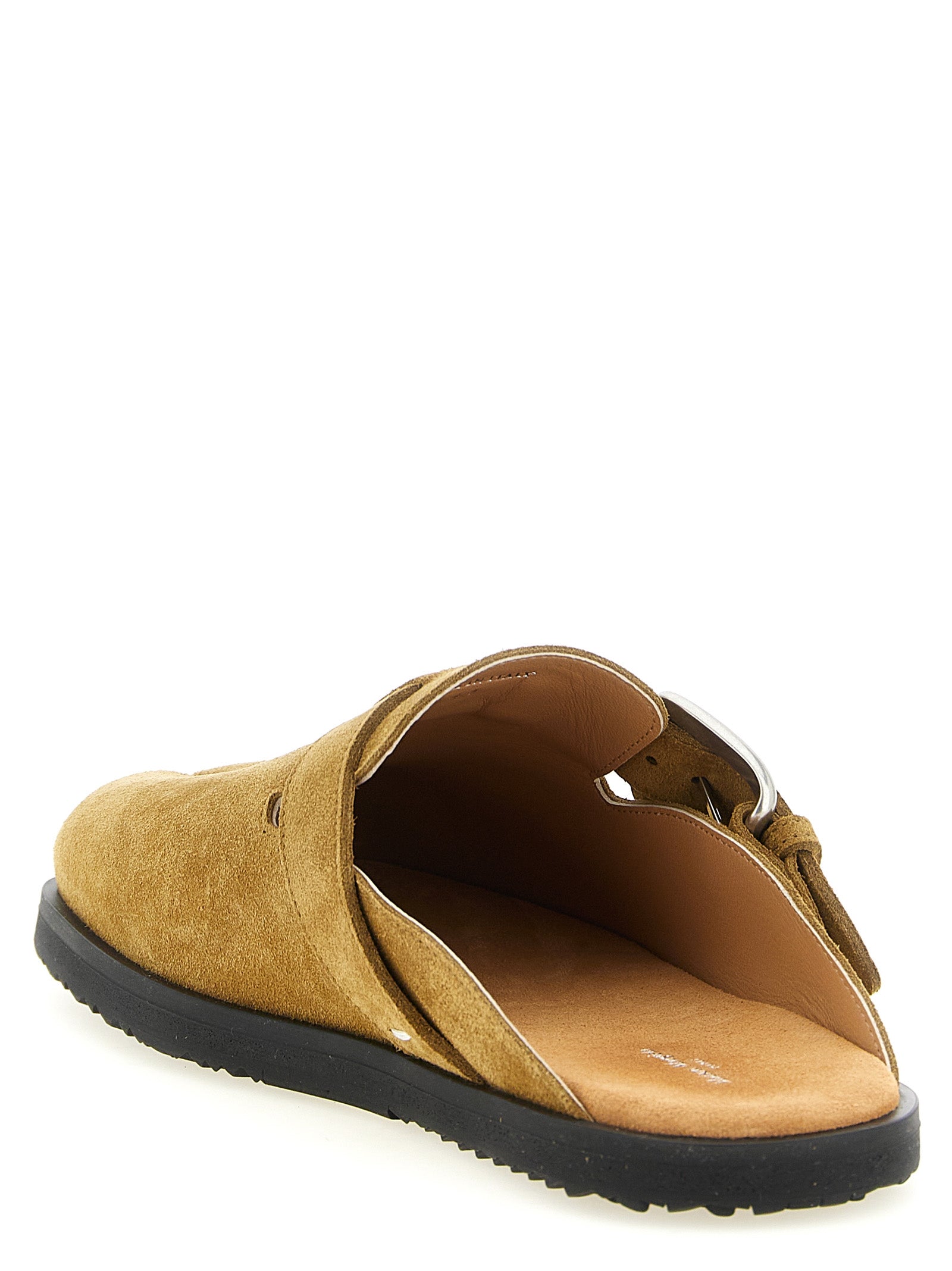 Experience the exquisite Maison Margiela Brown Calfskin Mules, where deconstructed artistry meets luxurious comfort, perfect for the discerning individual.