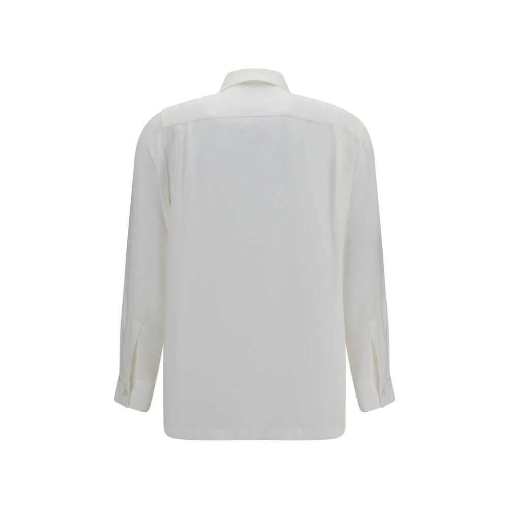 Elevate your wardrobe with the Max Mara White Silk Dress Shirt, crafted from luxurious heavy silk crepe de chine, embodying timeless elegance for the discerning individual.