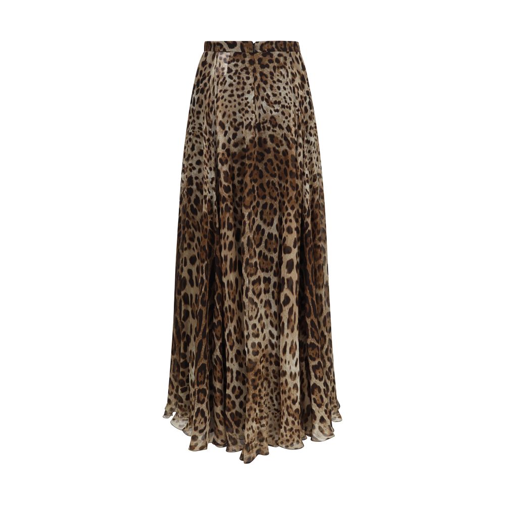 Indulge in the elegance of the Dolce & Gabbana Beige Silk Long Skirt, crafted from luxurious silk for a timeless silhouette that embodies sophistication and allure.