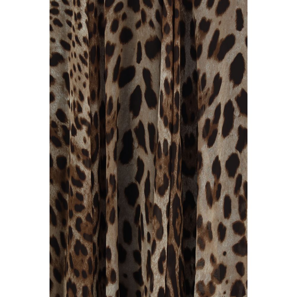 Elevate your wardrobe with the Dolce & Gabbana Beige Silk Long Skirt, a masterpiece of exquisite craftsmanship in luxurious leopard-print chiffon, perfect for any elegant occasion.