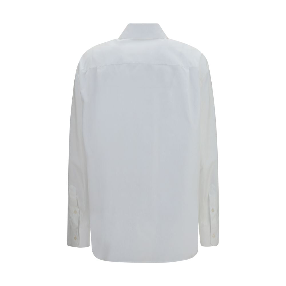 Discover the Dolce & Gabbana White Cotton Dress Shirt, a masterpiece of craftsmanship in premium cotton, embodying timeless elegance for the discerning individual.