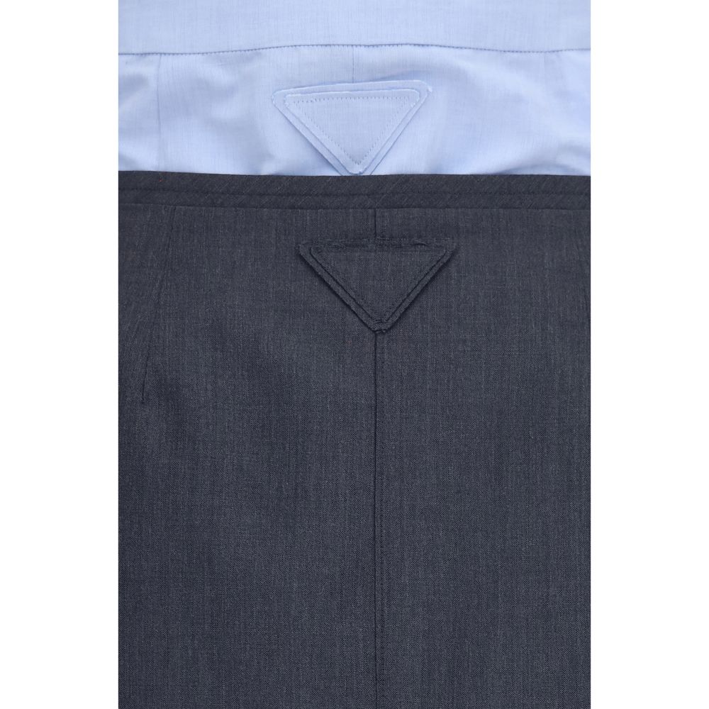 Elevate your wardrobe with the Prada Gray Cotton Midi Skirt, a masterpiece of double-layer craftsmanship in a luxurious cotton-linen blend, perfect for timeless elegance.