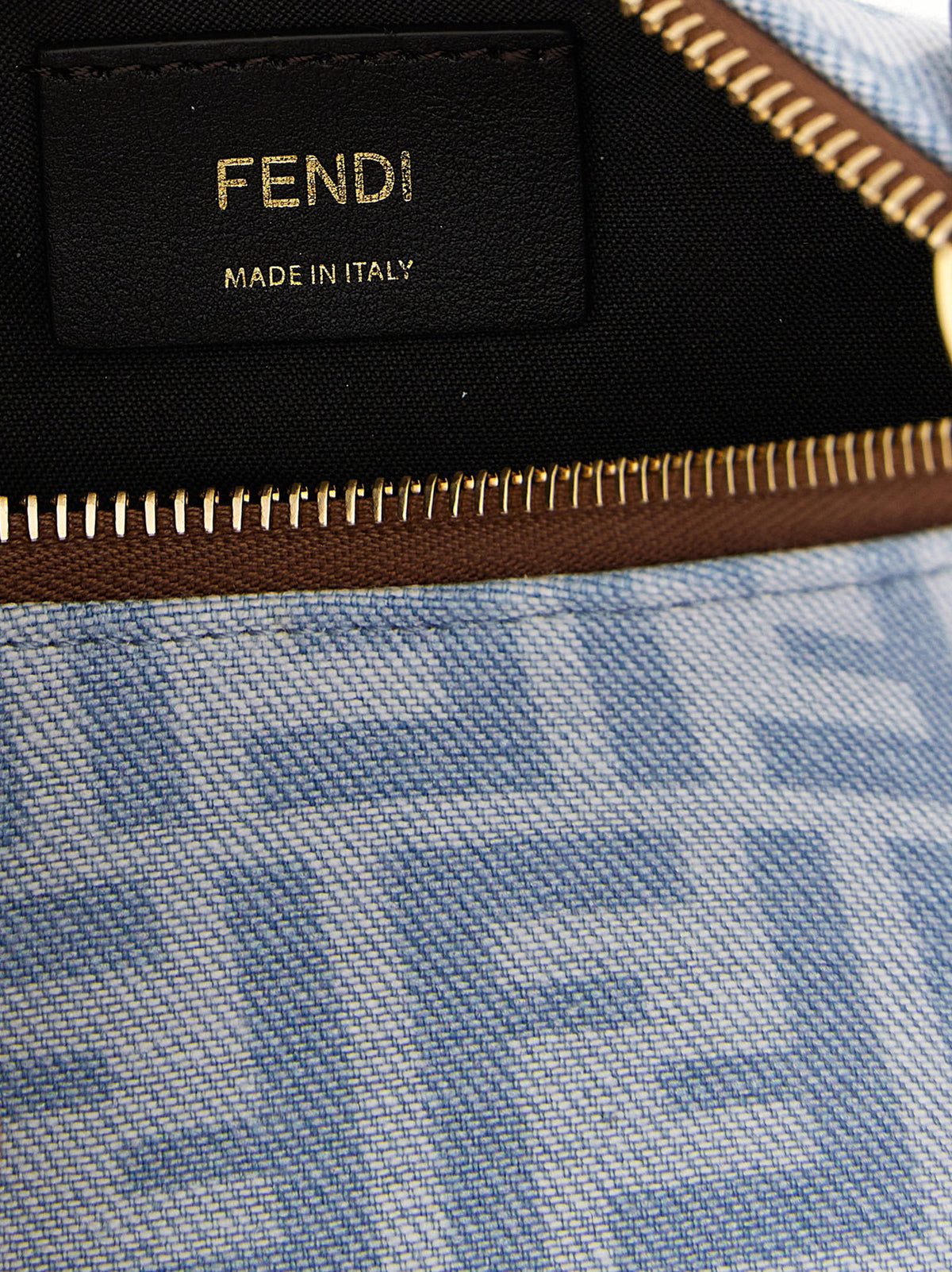 Elevate your style with the Fendi Blue Cotton Handbag from the Fendigraphy collection, crafted in Italy with exquisite denim and luxurious leather accents, embodying timeless elegance.
