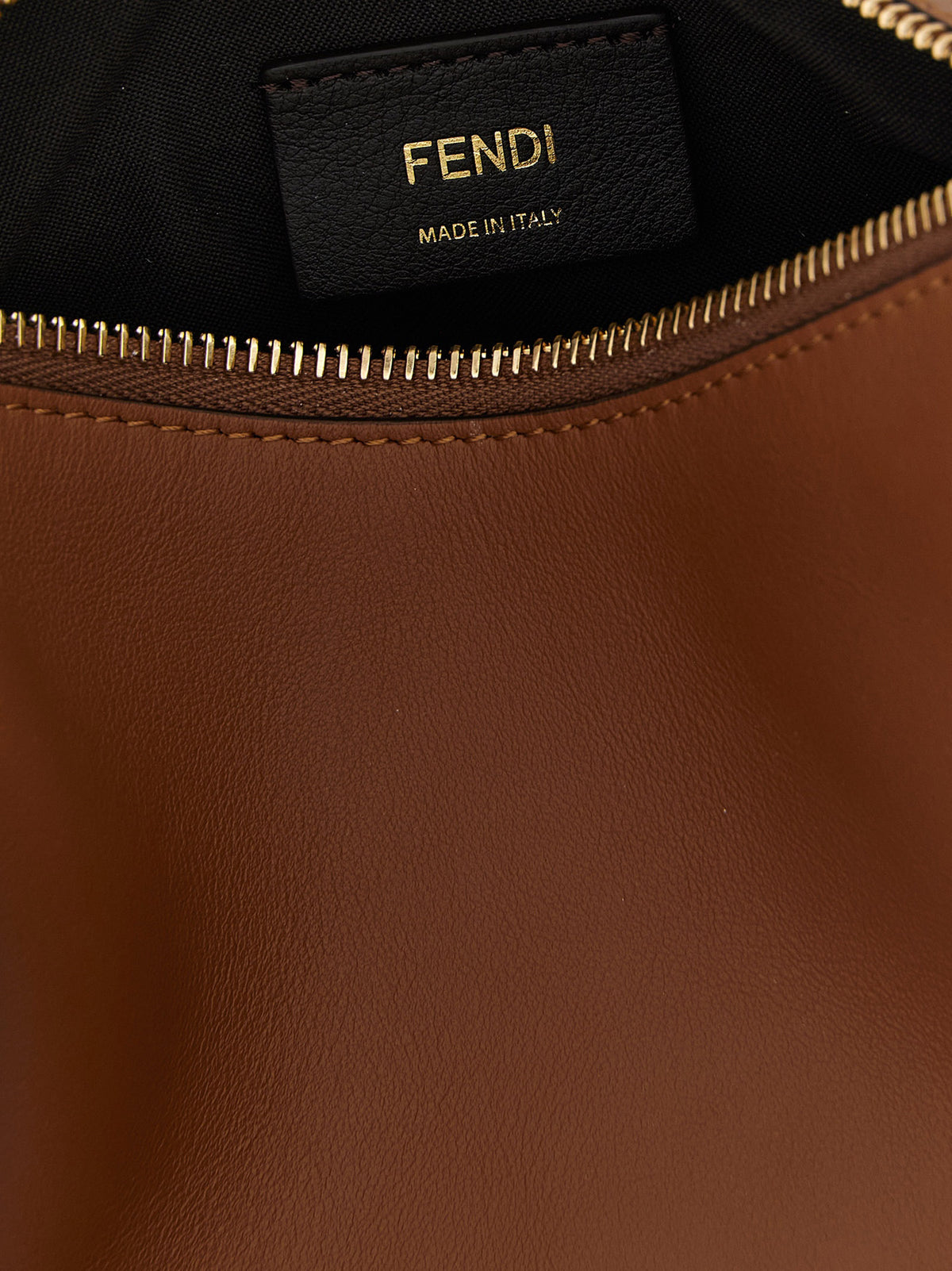 Discover the Fendi Brown Calfskin Handbag, a masterpiece of architectural elegance crafted in Italy, embodying luxury and sophistication for the discerning individual.