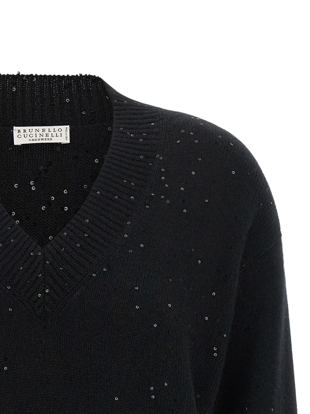 Experience the exquisite allure of the Brunello Cucinelli Black Cashmere Cardigan, a masterpiece of Italian craftsmanship in luxurious cashmere and silk, perfect for any discerning wardrobe.