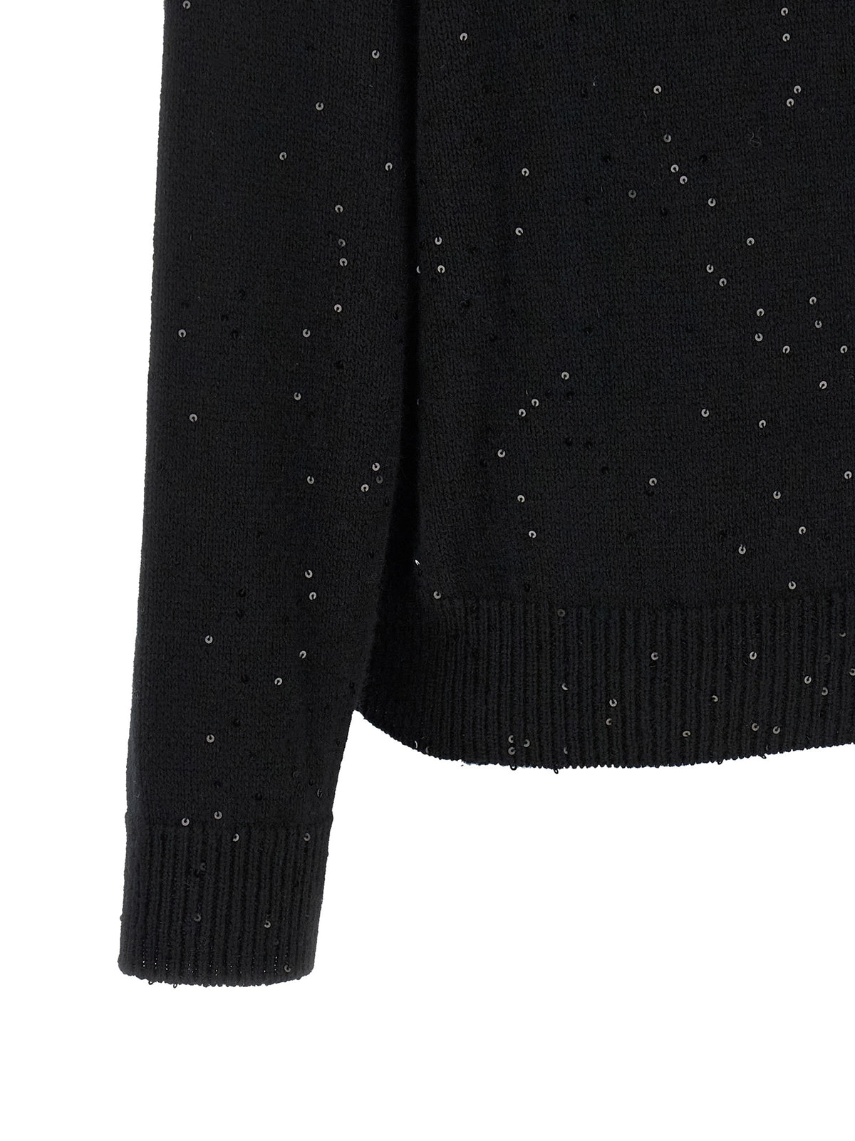 Experience the allure of the Brunello Cucinelli Black Cashmere Cardigan, where exquisite cashmere and silk craftsmanship elevate your wardrobe with timeless elegance and sophistication.