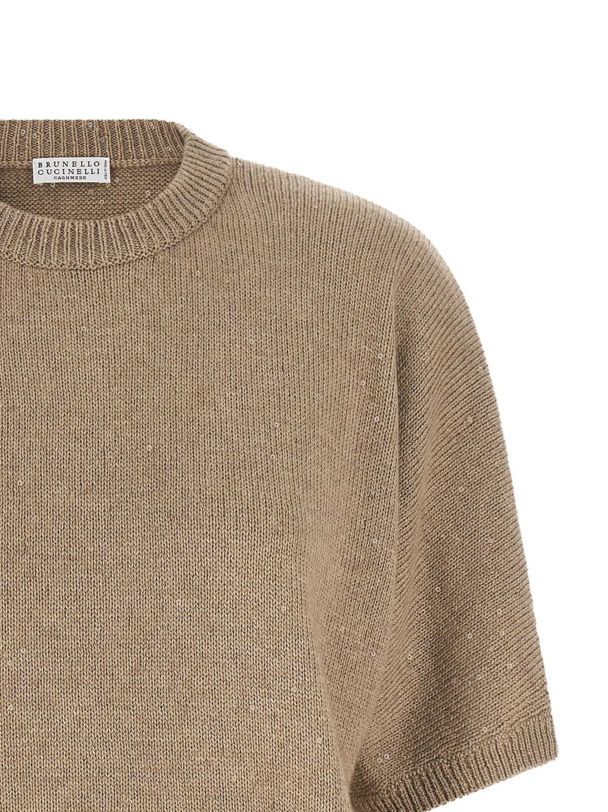 Experience the allure of the Brunello Cucinelli Beige Cashmere Cardigan, a luxurious blend of cashmere and silk, adorned with delicate sequins for timeless elegance.
