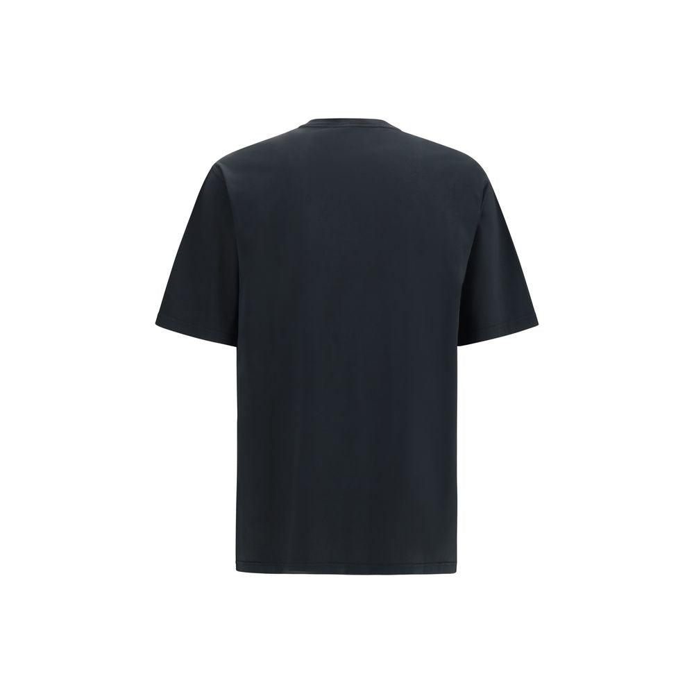 Indulge in the exquisite Dolce & Gabbana Black Cotton T-Shirt, a timeless luxury essential crafted from 100% cotton, embodying sophistication and effortless elegance for the discerning individual.