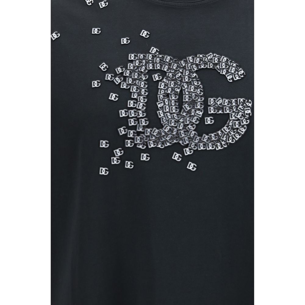 Indulge in the exquisite Dolce & Gabbana Black Cotton T-Shirt, a luxurious essential crafted from premium cotton, embodying timeless elegance for the discerning individual.