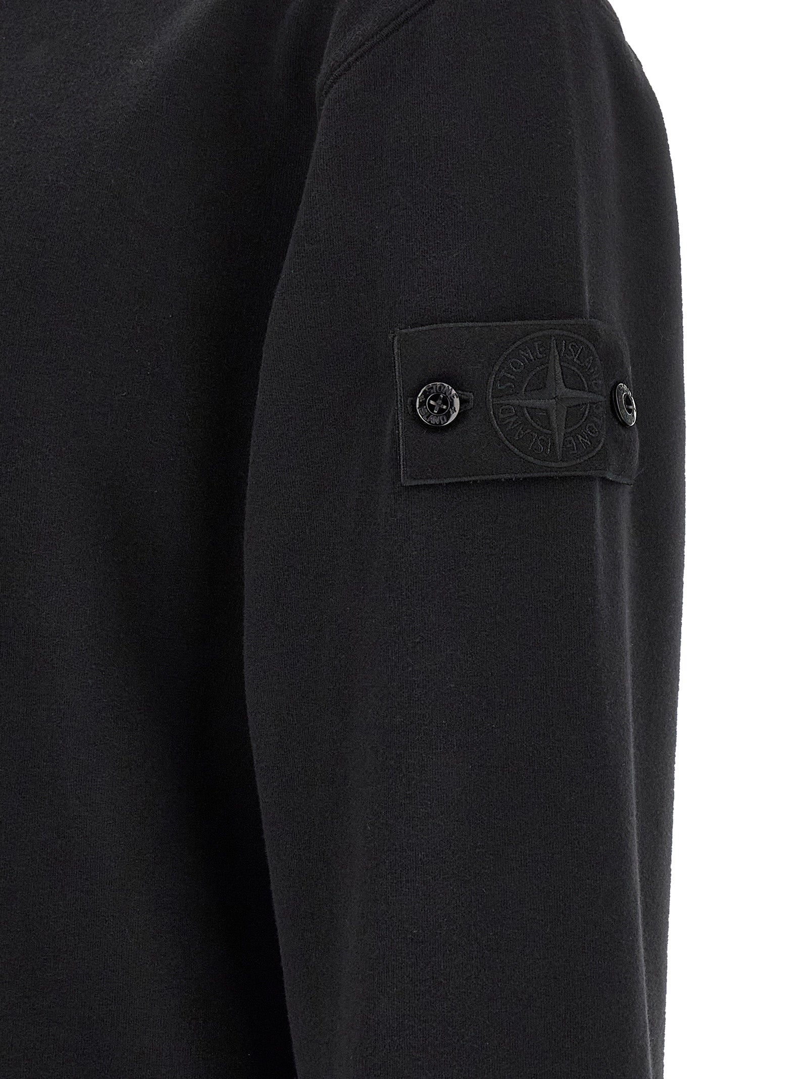 Elevate your wardrobe with the Stone Island Black Cotton Sweatshirt, crafted from sustainable organic cotton for unmatched comfort and timeless sophistication.