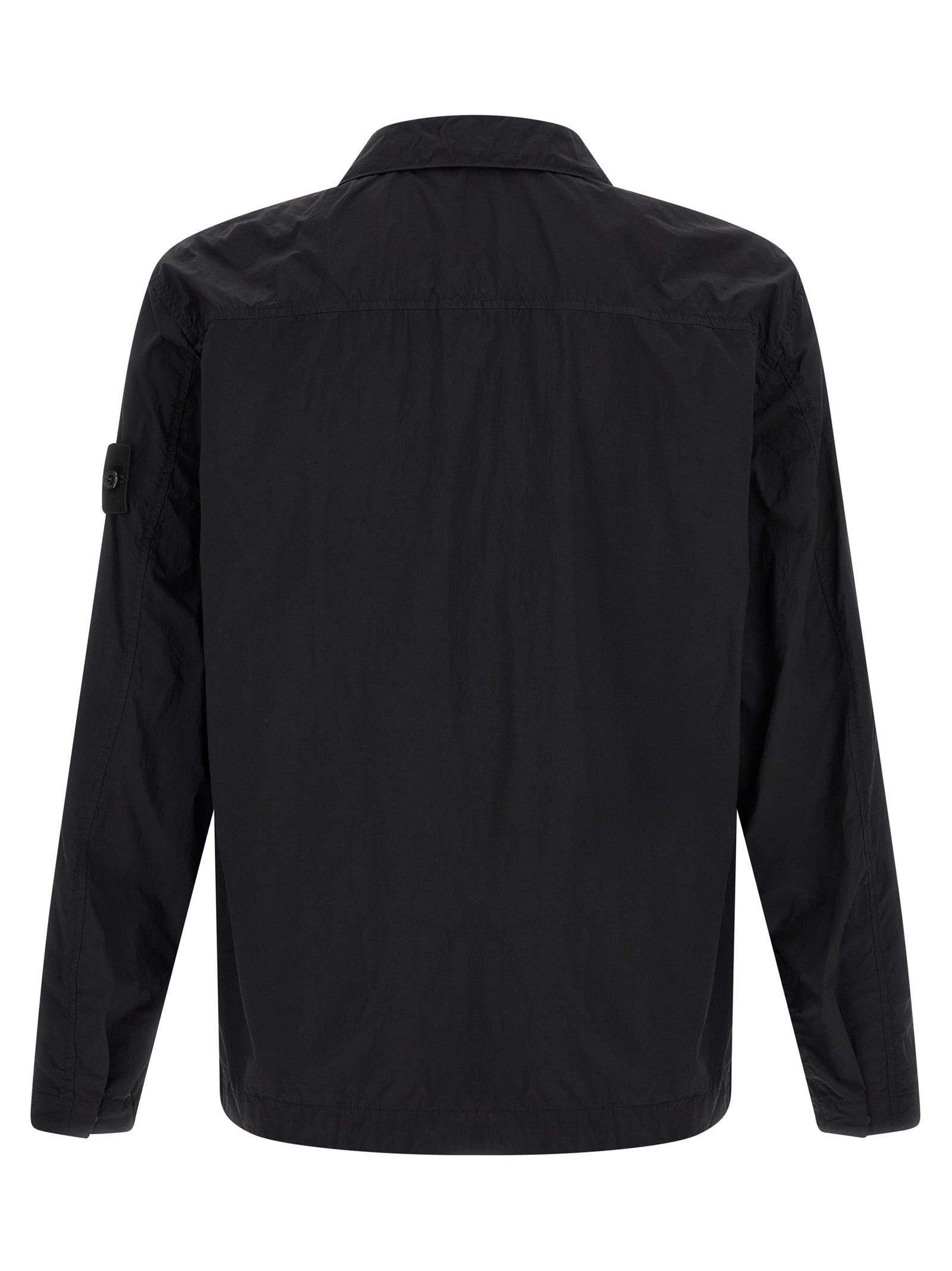 Discover the Stone Island Black Polyamide Blouse, a masterclass in sustainable luxury, crafted from recycled materials for the discerning individual who values elegance and eco-consciousness.