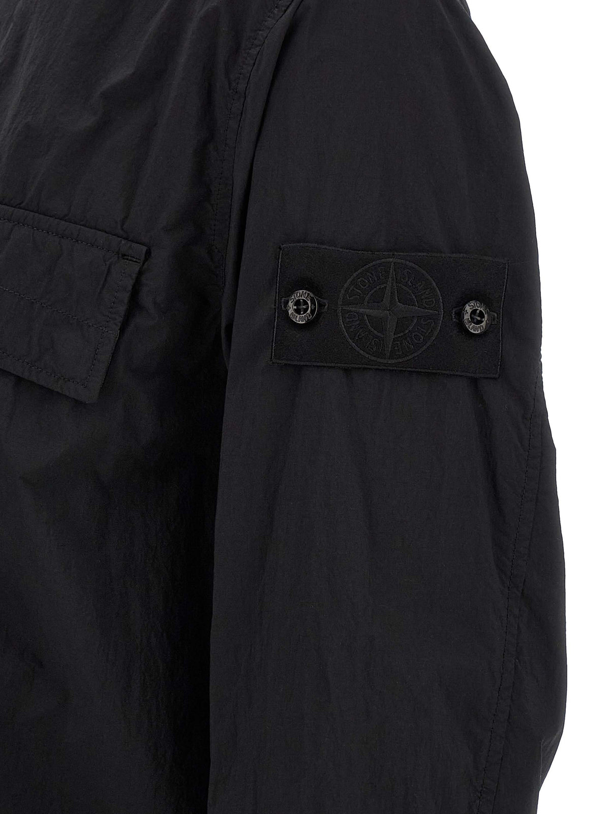 Elevate your style with the Stone Island Black Polyamide Blouse, crafted from sustainable materials for the discerning individual who values sophistication and eco-conscious luxury.
