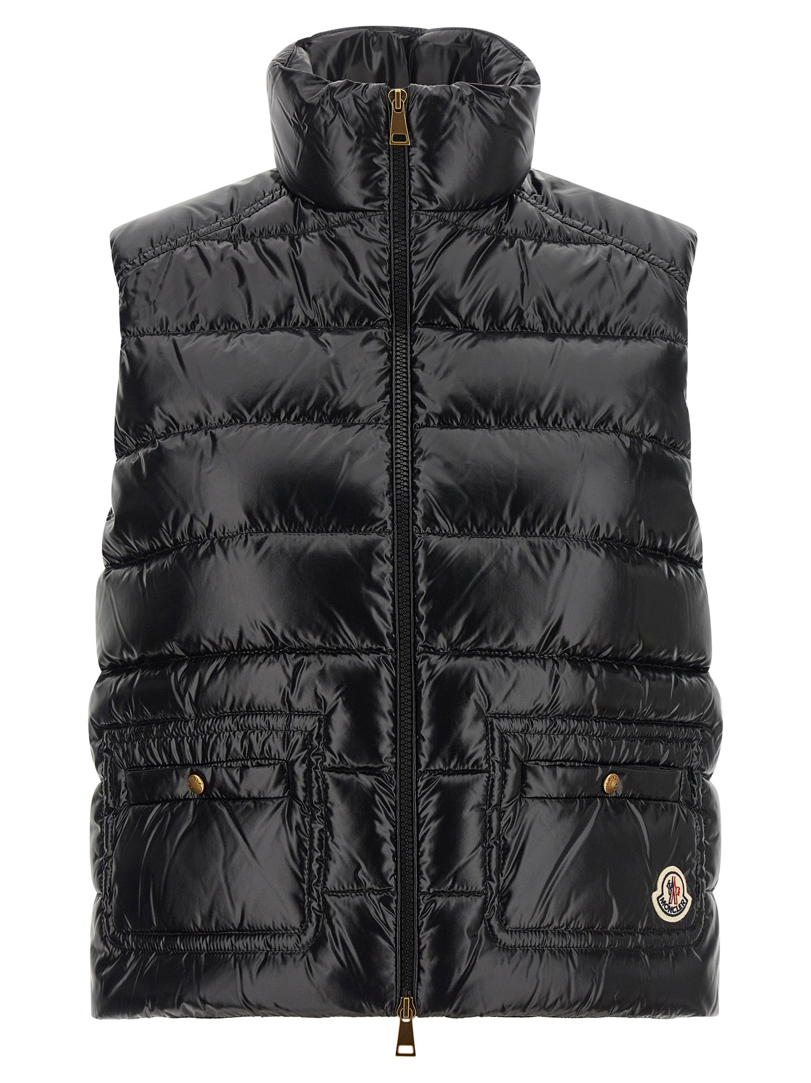 Discover the Moncler Black Polyamide Sleeveless Jacket, a masterpiece of luxury crafted from exquisite materials, blending timeless elegance with modern sophistication for the discerning individual.