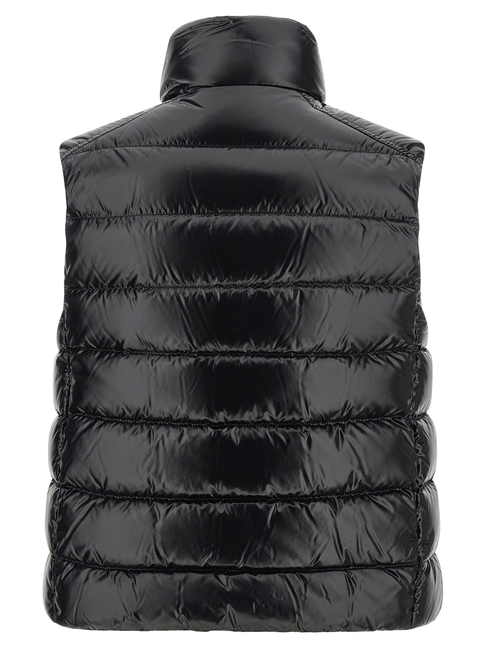 Discover the Moncler Black Polyamide Sleeveless Jacket, a masterpiece of luxurious craftsmanship, blending timeless elegance with modern sophistication for the discerning individual.