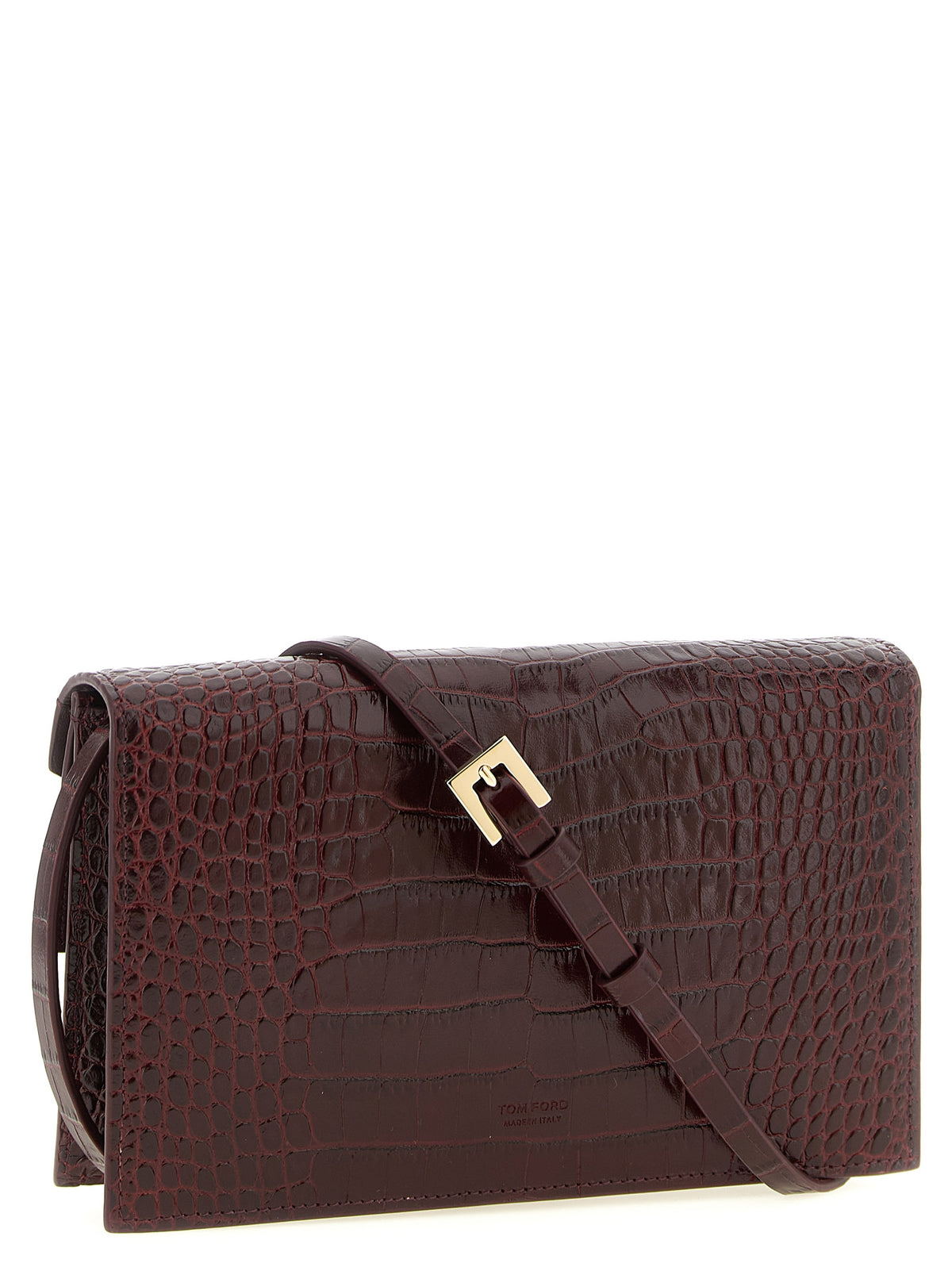 Discover the Tom Ford Bordeaux Calfskin Clutch Bag, a masterpiece of Italian craftsmanship in luxurious calfskin, perfect for elevating any ensemble with sophistication.