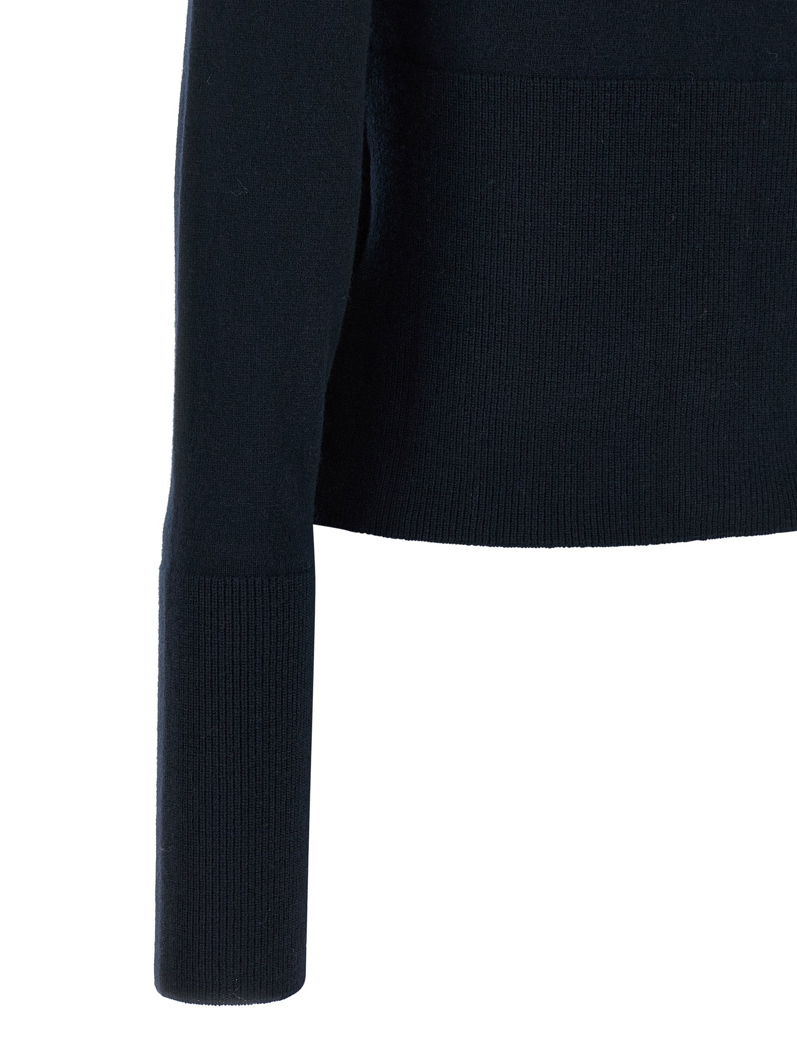 Indulge in the elegance of Chloé's Blue Wool Cardigan, a timeless piece crafted from pure wool, embodying sophistication and luxury for the discerning individual.