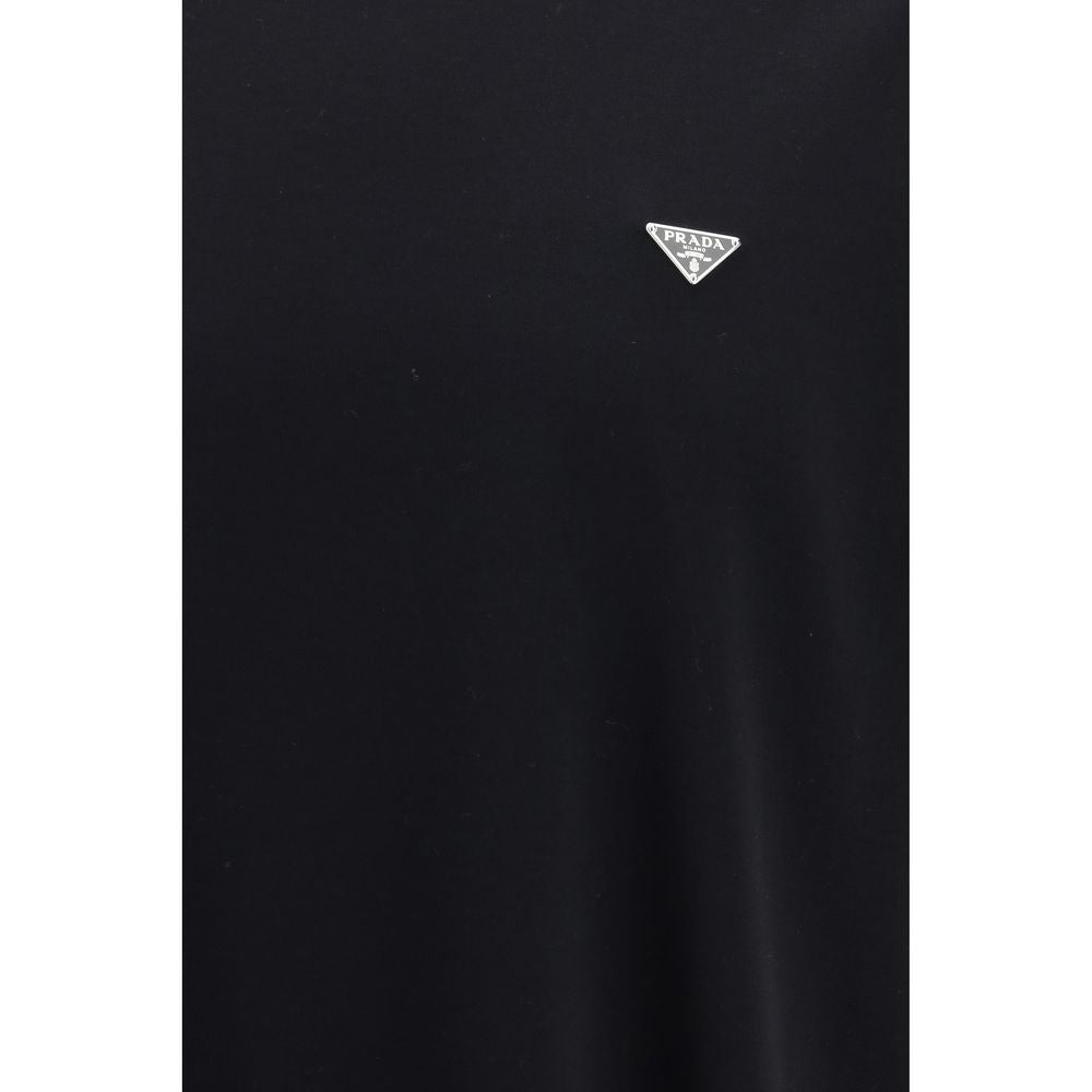 Experience the epitome of luxury with the Prada Black Cotton T-Shirt, crafted from 100% cotton for unparalleled comfort and style, perfect for any sophisticated wardrobe.