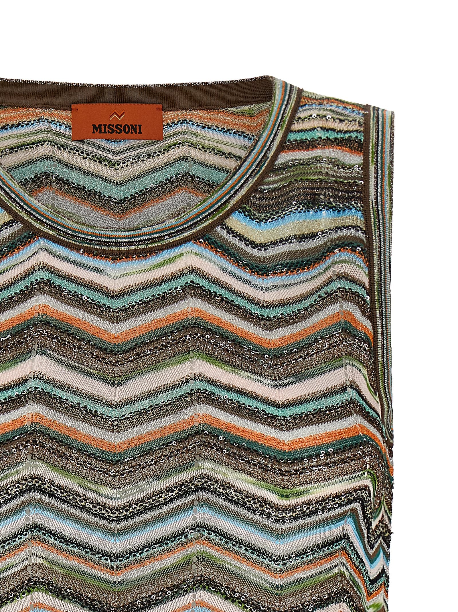 Elevate your style with the Missoni Multicolor Viscose Blouse, a luxurious blend of vibrant hues and metallic accents, embodying exquisite Italian craftsmanship for the discerning individual.