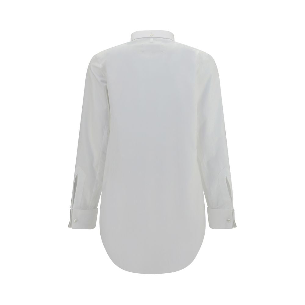 Discover the Maison Margiela White Cotton Dress Shirt, a masterpiece of 100% cotton craftsmanship, embodying timeless elegance and modern sophistication for the discerning individual.