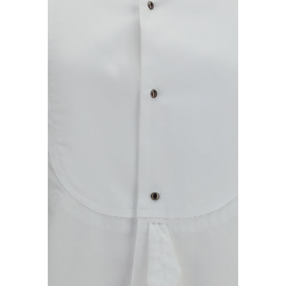 Indulge in the Maison Margiela White Cotton Dress Shirt, a masterpiece of 100% cotton craftsmanship, embodying timeless elegance and modern sophistication for discerning tastes.