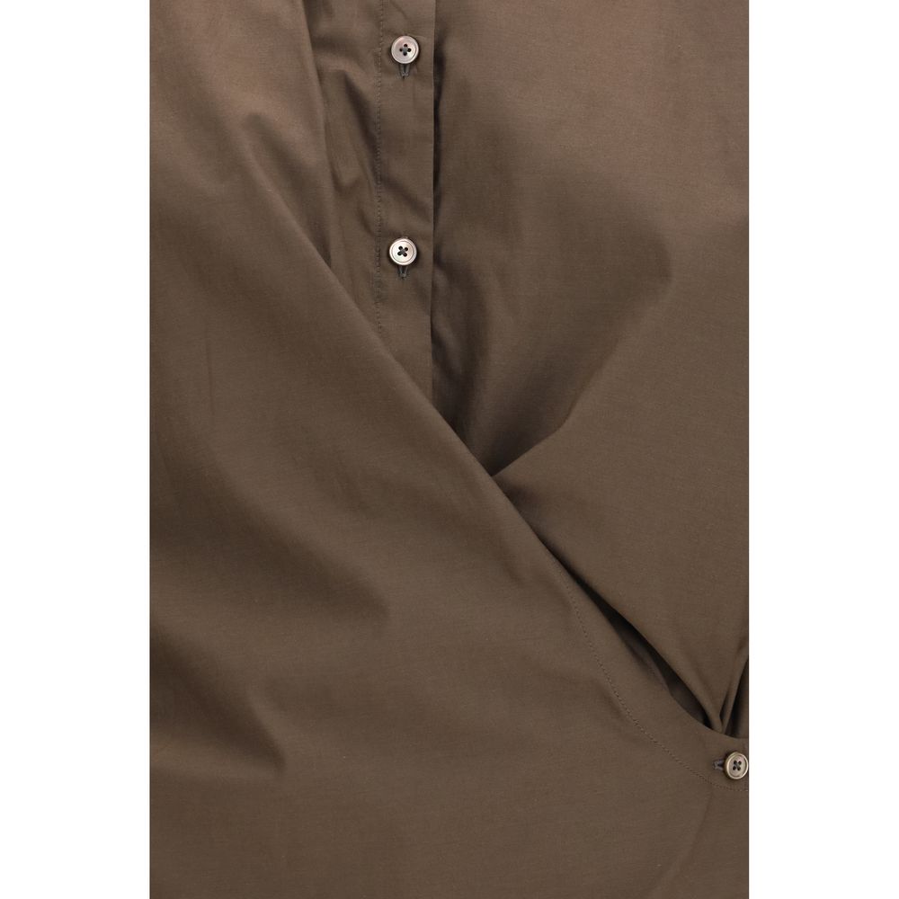 Indulge in the Lemaire Brown Cotton Shirt, a luxurious blend of cotton and silk, embodying sophisticated craftsmanship for timeless elegance in every occasion.