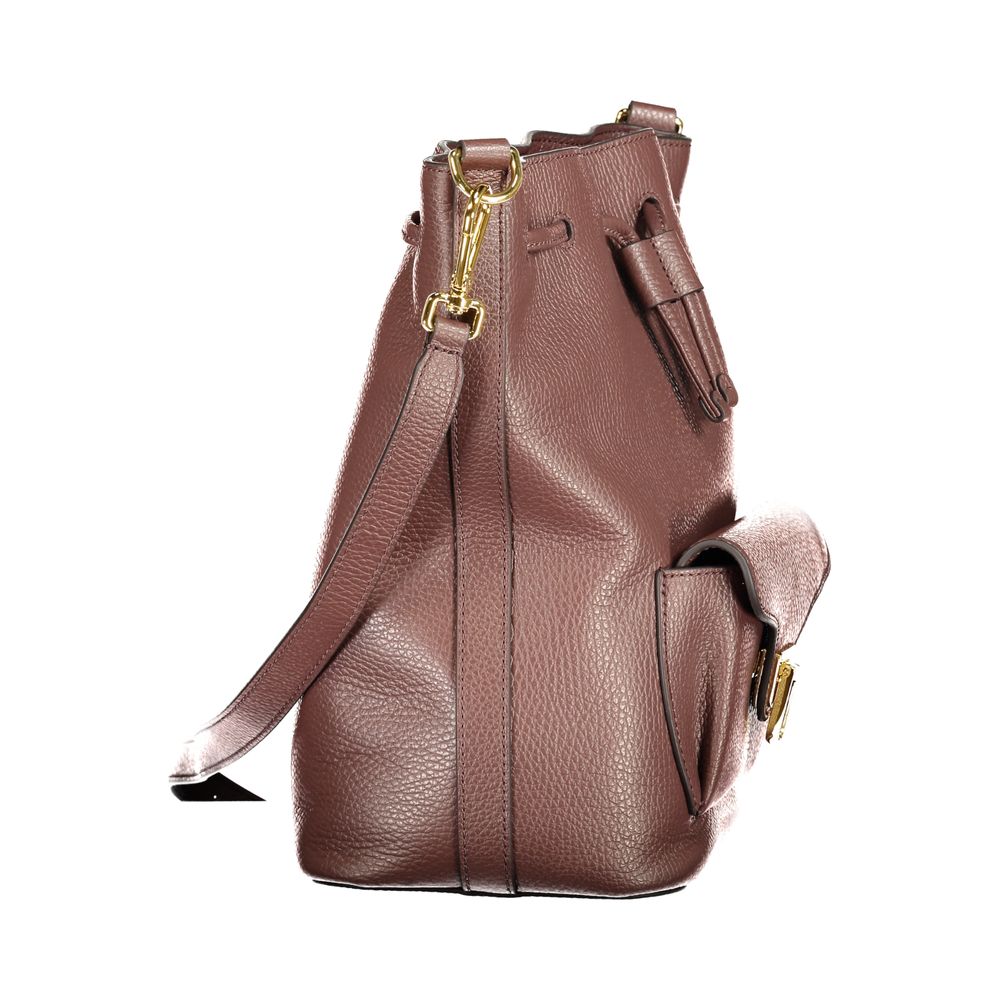 Indulge in the Coccinelle Brown Leather Handbag, a masterpiece of exquisite craftsmanship that embodies timeless luxury and sophisticated elegance for the discerning individual.