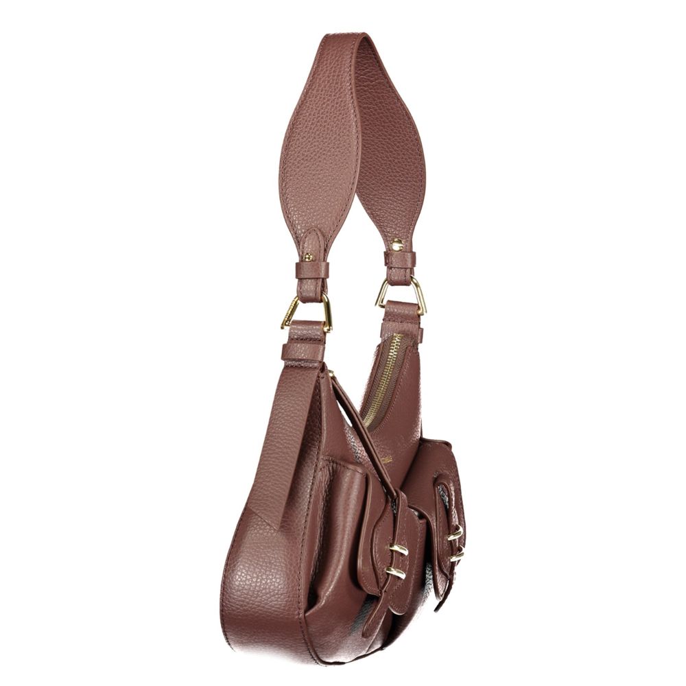 Discover the Coccinelle Brown Leather Handbag, a masterpiece of exquisite craftsmanship and timeless elegance, perfect for those who embrace luxury and sophistication.