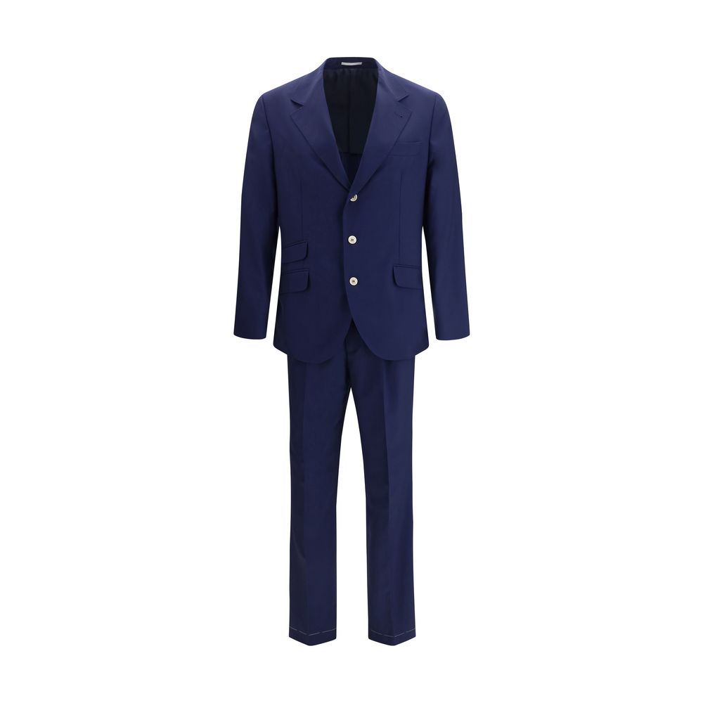 Discover the Brunello Cucinelli Blue Wool Oves Aries Two-Piece Suit, a masterpiece of 100% fleece wool, embodying timeless elegance and refined sophistication for the discerning individual.
