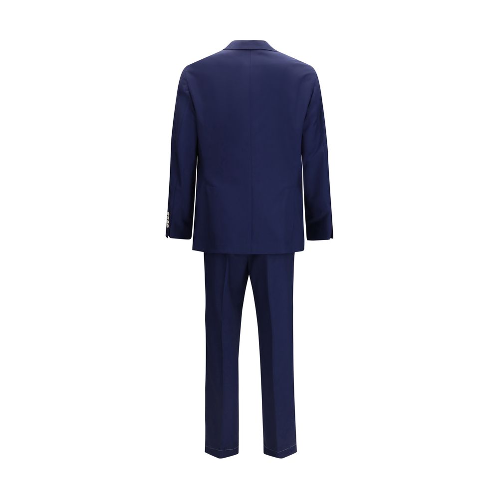 Elevate your wardrobe with the Brunello Cucinelli Blue Wool Oves Aries Two-Piece Suit, a masterpiece of craftsmanship in luxurious fleece wool, perfect for the discerning individual.