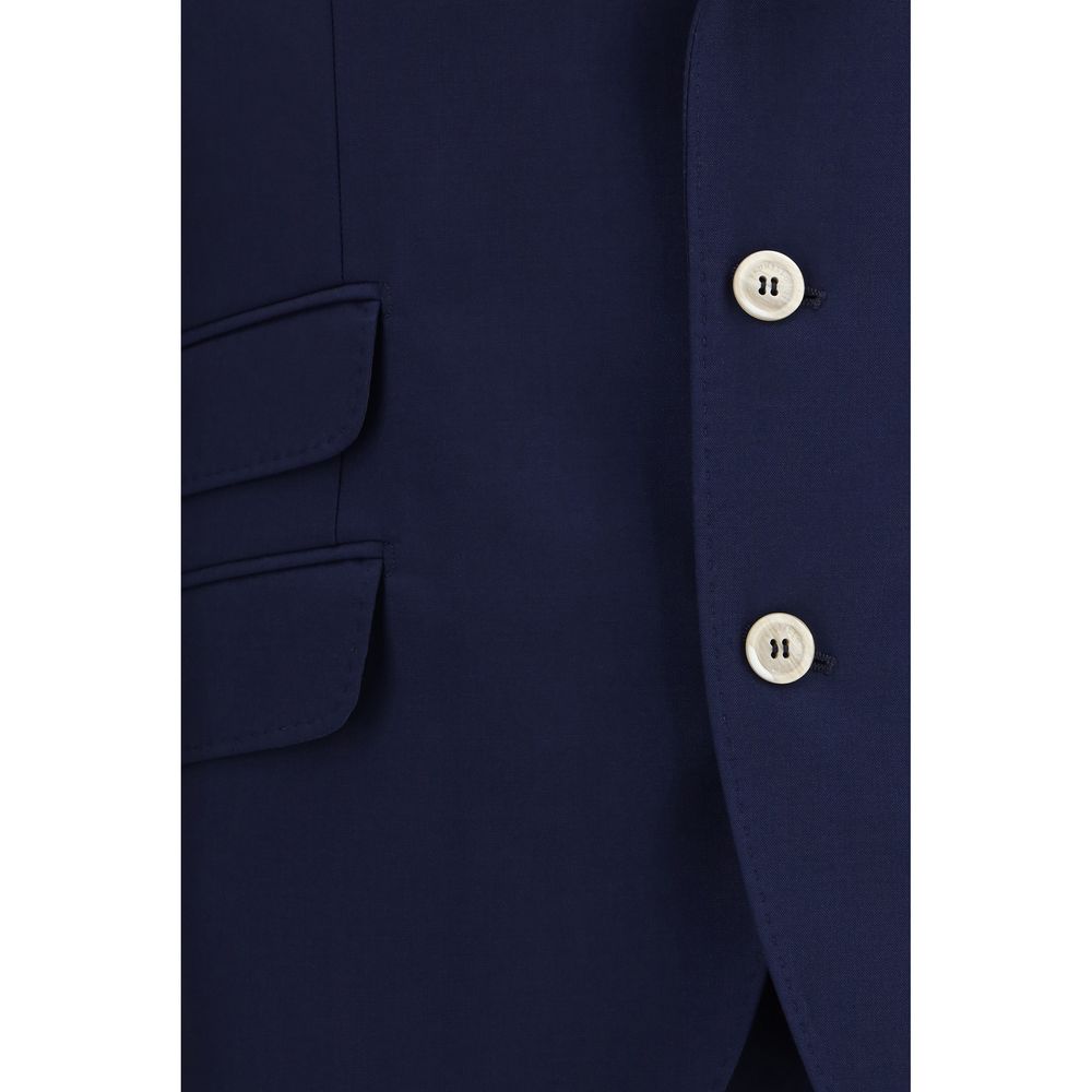 Discover the Brunello Cucinelli Blue Wool Oves Aries Two-Piece Suit, a testament to exquisite craftsmanship in 100% Fleece Wool, perfect for the discerning individual seeking timeless elegance.