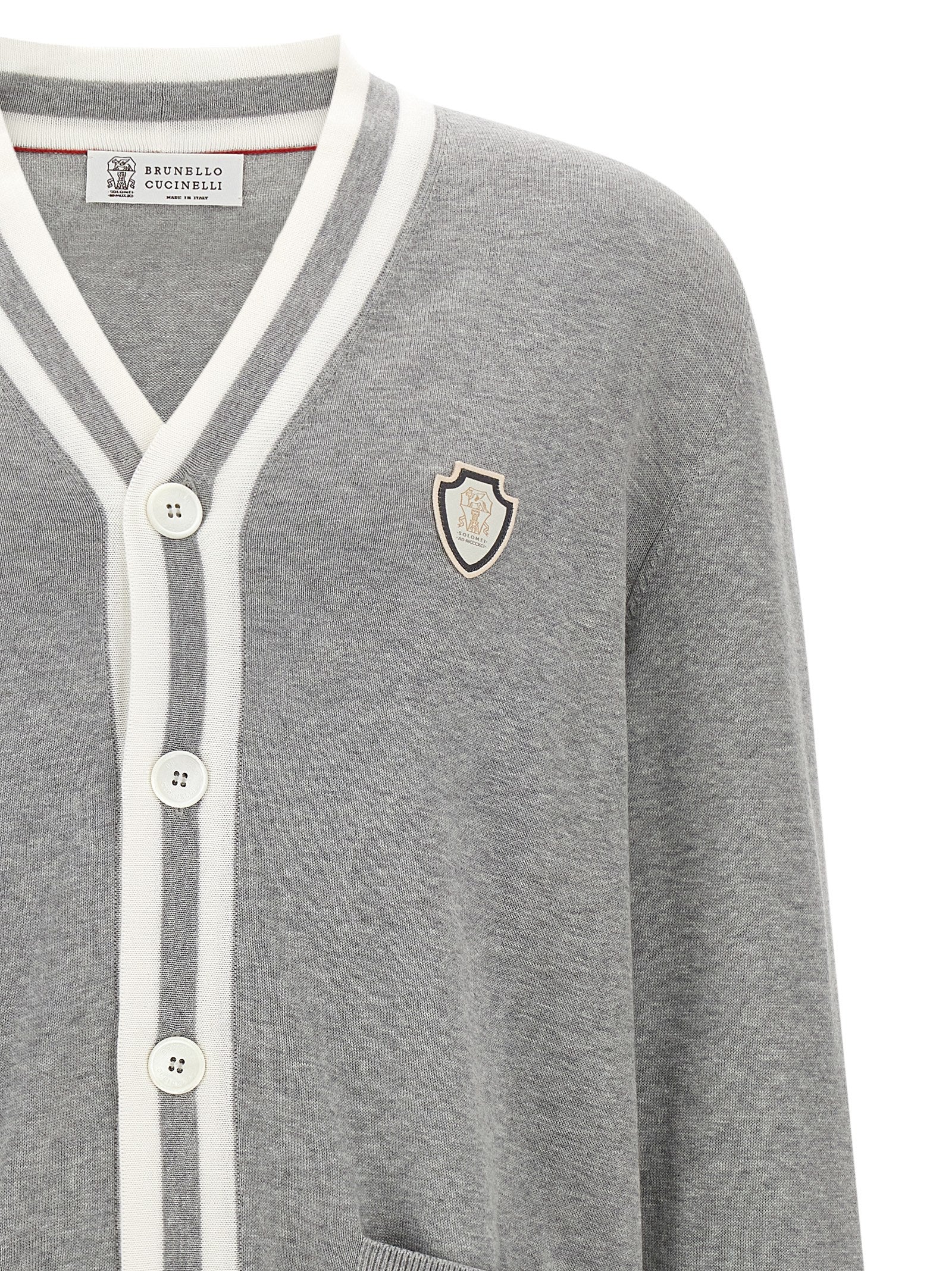 Indulge in the exquisite Brunello Cucinelli Gray Cotton Cardigan, a masterpiece of Italian craftsmanship, blending timeless elegance with luxurious comfort for the discerning individual.