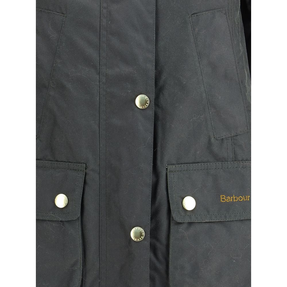 Elevate your wardrobe with the Barbour Bicolor Cotton Coat, a luxurious blend of tradition and modernity, crafted from 100% cotton for timeless elegance and comfort.