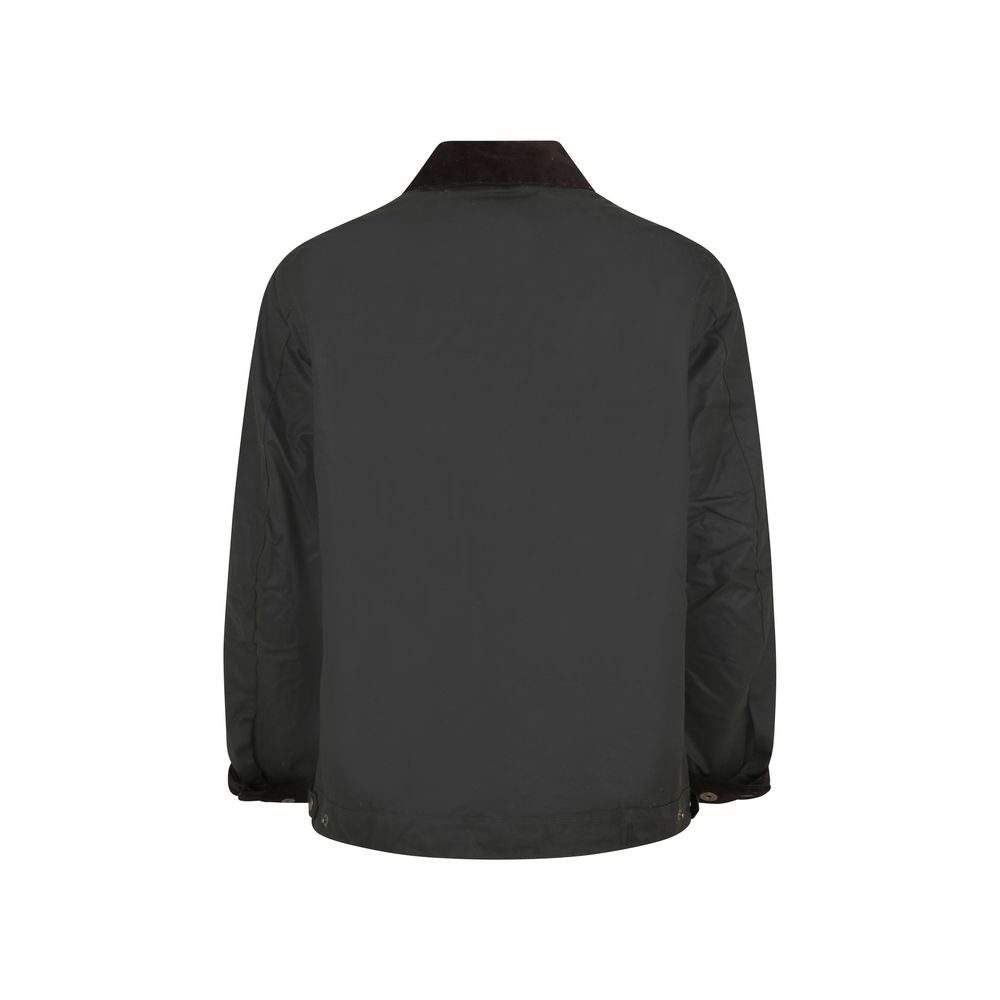 Elevate your style with the Barbour International Bicolor Cotton Coat, a masterpiece of craftsmanship in 100% cotton from the AW26 collection, blending sophistication and practicality for the discerning individual.