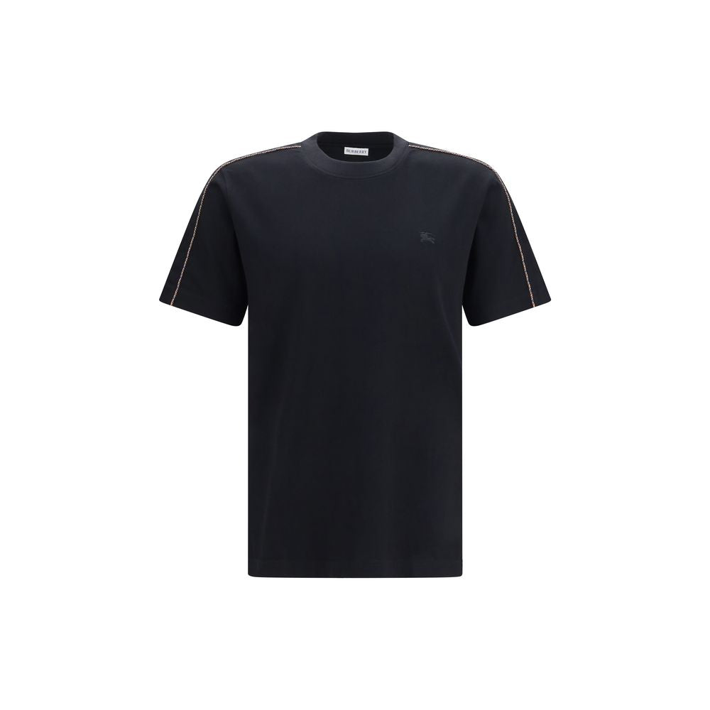 Indulge in the Burberry Black Cotton T-Shirt, a luxurious blend of comfort and sophistication, embodying timeless elegance for the discerning individual.