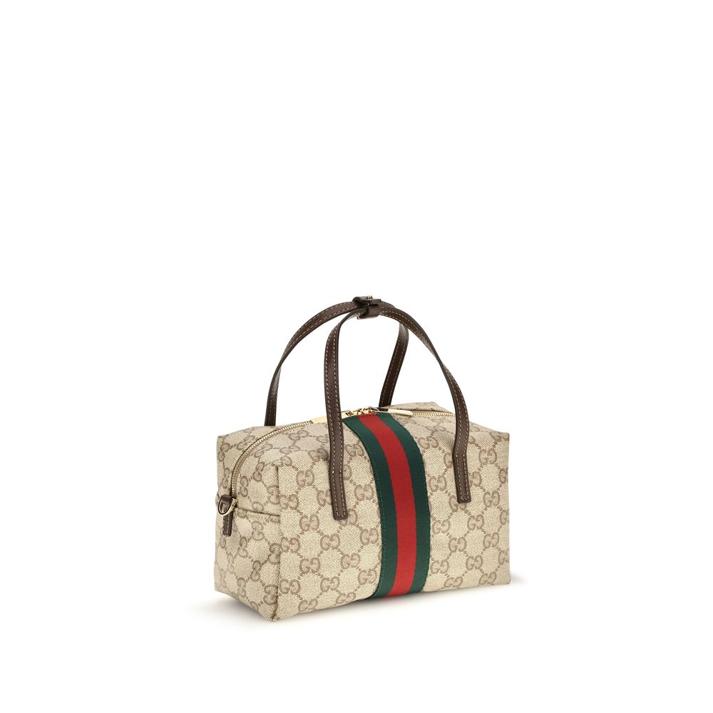 Experience the exquisite allure of the Gucci Beige Fabric Handbag, a masterful blend of luxurious craftsmanship and timeless design, perfect for elevating any ensemble.