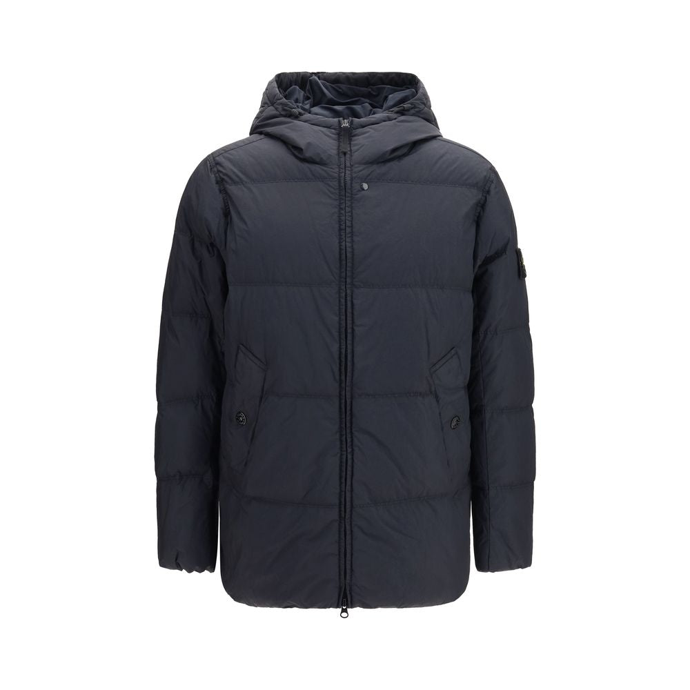 Indulge in the Stone Island Blue Goose Down Full-Length Jacket, a masterpiece of recycled nylon and luxurious goose down, blending technical innovation with sophisticated style for the discerning individual.