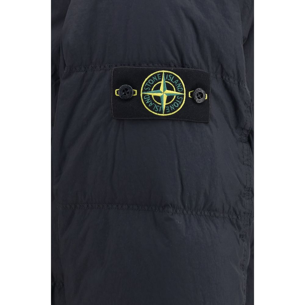 Elevate your outerwear collection with the Stone Island Blue Goose Down Full-Length Jacket, crafted from luxurious recycled nylon and filled with RDS-certified down for unparalleled warmth and style.