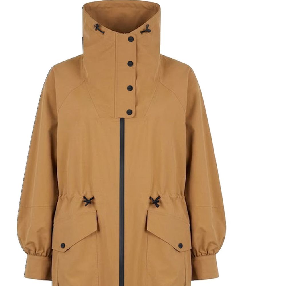 Discover the Herno Brown Polyester Coat, a masterpiece of water-repellent design and windproof elegance, embodying timeless sophistication for the discerning individual.