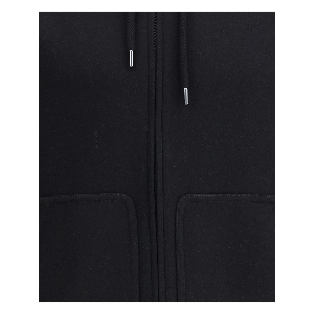 Indulge in the refined elegance of the Brunello Cucinelli Black Cotton Sweatshirt, crafted from luxurious materials for a sophisticated, minimalist aesthetic.