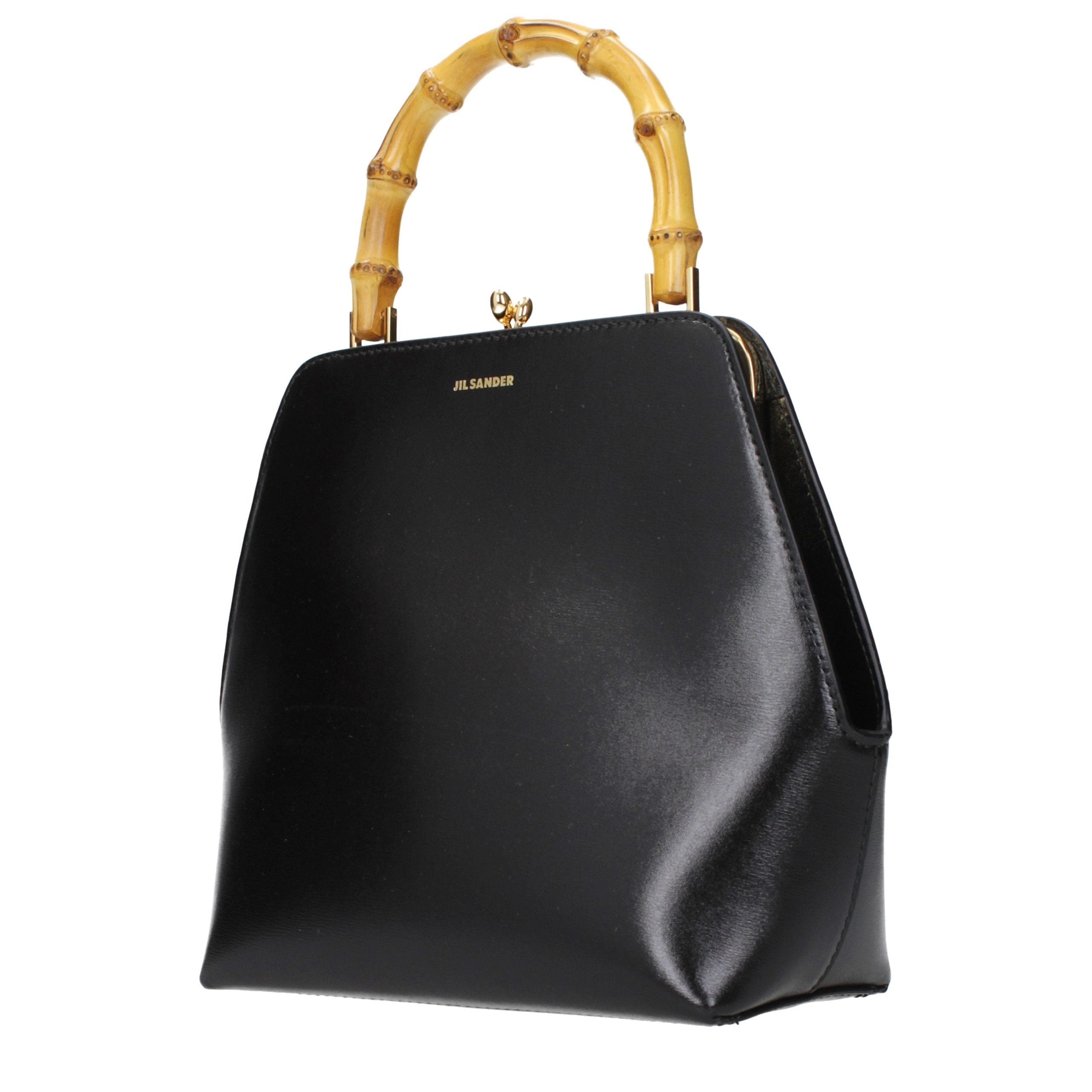 Elevate your style with the Jil Sander Black Leather Handbag, a symbol of exquisite craftsmanship and timeless luxury, perfect for any sophisticated occasion.