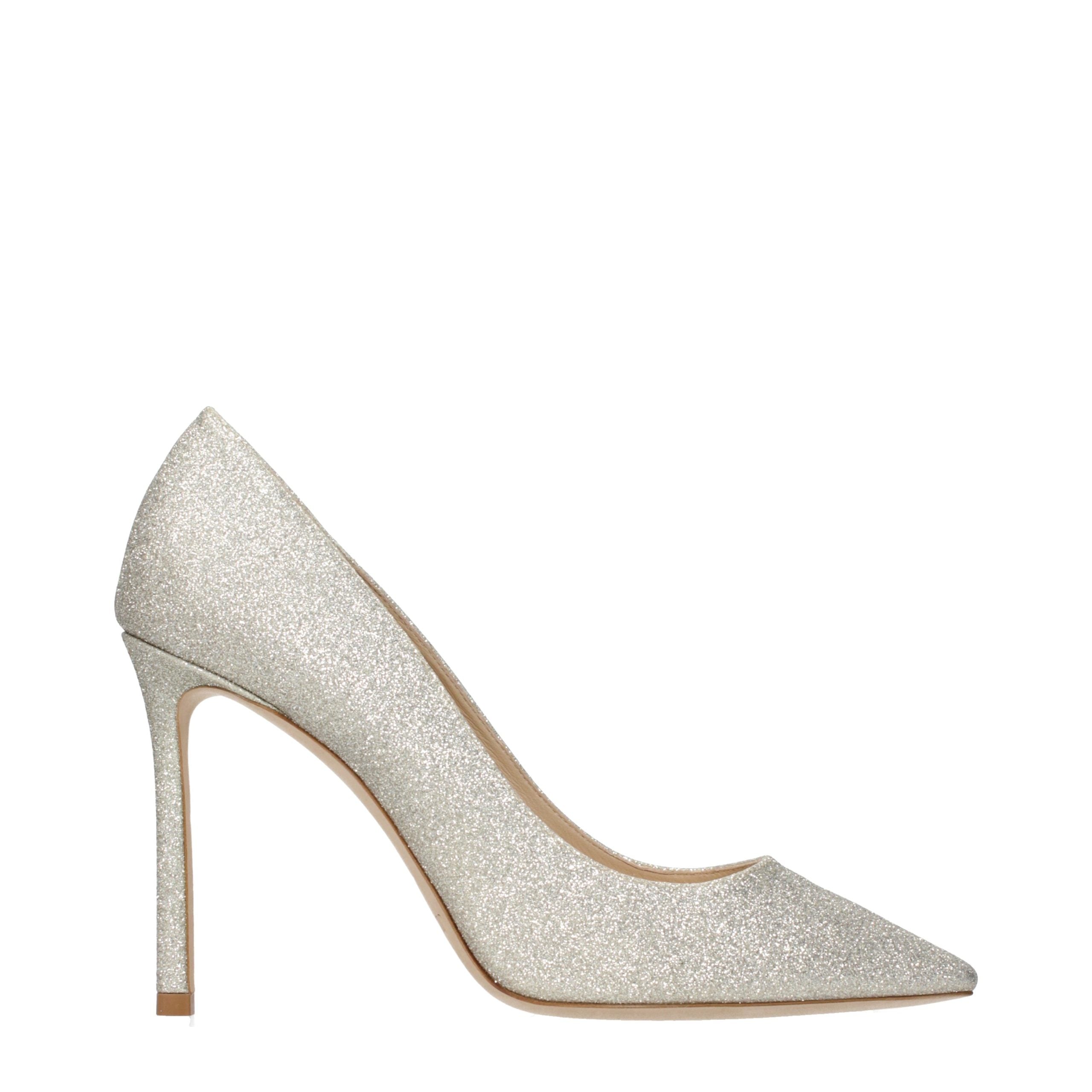 Elevate your elegance with Jimmy Choo Gold High Heel Pumps, a symbol of luxurious craftsmanship that transforms every occasion into a celebration of sophistication.